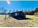 Log home exterior with deck and fenced yard at 5199 Helms End Of Trl, Lincolnton, NC 28092