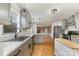 Modern kitchen with gray cabinets and stainless steel appliances at 1176 Peppertree Dr, Mount Holly, NC 28120