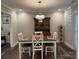 Charming dining room with a wooden hutch and a white table set at 1204D Northgate Dr, Shelby, NC 28150