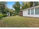 Large backyard with shed and screened porch at 138 Wyanoke Ave, Charlotte, NC 28205