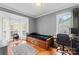 Cozy bedroom with a built-in window seat and hardwood floors at 138 Wyanoke Ave, Charlotte, NC 28205