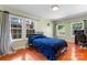 Functional bedroom with a bed and home office setup at 138 Wyanoke Ave, Charlotte, NC 28205