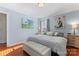 Spacious bedroom with hardwood floors and large windows at 138 Wyanoke Ave, Charlotte, NC 28205