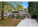 House exterior features stone accents, landscaping, and a front porch at 138 Wyanoke Ave, Charlotte, NC 28205
