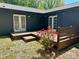 Inviting backyard deck with access from french doors, perfect for outdoor relaxation and enjoyment at 3452 Airlie St, Charlotte, NC 28205