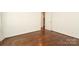 Empty bedroom with wood floors and natural light at 3452 Airlie St, Charlotte, NC 28205