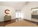 Bedroom features hardwood floors, lots of natural light, and an ensuite bathroom at 3452 Airlie St, Charlotte, NC 28205