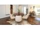 Elegant dining area features modern lighting, stylish table set, and hardwood floors at 3452 Airlie St, Charlotte, NC 28205