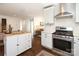 Modern kitchen with stainless steel appliances, white cabinetry, and open layout at 3452 Airlie St, Charlotte, NC 28205