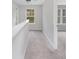 Bright hallway with neutral carpet and natural light at 6003 Hawk View Rd, Waxhaw, NC 28173