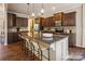 Spacious kitchen with granite countertops, stainless steel appliances, and a large island with bar seating at 6003 Hawk View Rd, Waxhaw, NC 28173