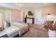 Large main bedroom features neutral tones, plenty of space, and elegant decor at 6003 Hawk View Rd, Waxhaw, NC 28173