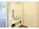 Convenient mud room with storage, a bench, and hooks for organization by the front door at 6003 Hawk View Rd, Waxhaw, NC 28173