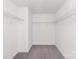 Spacious walk-in closet with wire shelving and neutral carpet at 6003 Hawk View Rd, Waxhaw, NC 28173