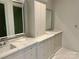 Elegant bathroom showcasing double vanities and marble countertops at 1168 Queens Rd, Charlotte, NC 28207