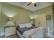 Comfortable bedroom with plush bed, nightstands, and neutral decor at 16908 Ashton Oaks Dr, Charlotte, NC 28278