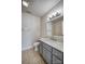 Bathroom features gray vanity, white countertop, and tiled floor at 2306 6Th Nw Ave, Hickory, NC 28601