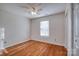 Bedroom with hardwood floors and a window with blinds at 2306 6Th Nw Ave, Hickory, NC 28601