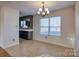 Separate dining area with tile flooring and chandelier at 2306 6Th Nw Ave, Hickory, NC 28601