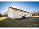 Back of house, showcasing landscaping and AC unit at 2306 6Th Nw Ave, Hickory, NC 28601