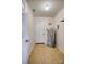 Laundry area with water heater and tile flooring at 2306 6Th Nw Ave, Hickory, NC 28601