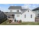 Backyard with patio, screened porch and colorful chairs at 440 Luray Way, Rock Hill, SC 29730