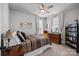 Comfortable bedroom with a queen-size bed and bookshelf at 440 Luray Way, Rock Hill, SC 29730