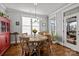 Dining room with hardwood floors, round table, and access to deck at 440 Luray Way, Rock Hill, SC 29730