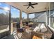 Relaxing screened porch with comfortable seating and view of backyard at 440 Luray Way, Rock Hill, SC 29730