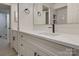 Modern bathroom with white cabinets and a quartz countertop at 4601 Coronado Dr # C, Charlotte, NC 28212