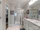 Double vanity bathroom with a large walk-in shower and walk-in closet at 6235 Scuttle Ln, Denver, NC 28037