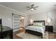 Main bedroom with a barn door and ensuite bathroom at 6235 Scuttle Ln, Denver, NC 28037