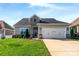 Curb appeal abounds in this charming craftsman style home with stone accents at 6235 Scuttle Ln, Denver, NC 28037