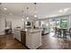 Open concept kitchen with granite counters and stainless steel appliances at 6235 Scuttle Ln, Denver, NC 28037