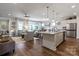 Modern kitchen with island and stainless steel appliances at 6235 Scuttle Ln, Denver, NC 28037