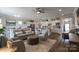 Open floor plan living room with kitchen and dining area at 6235 Scuttle Ln, Denver, NC 28037