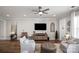 Spacious living room featuring hardwood floors and a cozy sitting area at 6235 Scuttle Ln, Denver, NC 28037