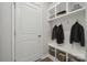 Well-organized mudroom with built-in shelving and hooks, providing ample storage for coats and accessories at 885 Exeter Dr, Sherrills Ford, NC 28673