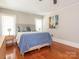 Bedroom featuring a bed with blue linens and natural light at 1411 Lineberger Ave, Gastonia, NC 28052