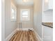View of a pantry area with hook ups and natural light from dual windows at 1411 Lineberger Ave, Gastonia, NC 28052