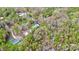 Secluded property with a long driveway surrounded by dense trees creating a private oasis from above at 2164 Mission Rd, York, SC 29745