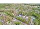 Sprawling aerial view of the property, surrounded by dense trees and landscape, offering a private retreat at 2164 Mission Rd, York, SC 29745