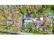 A high-angle aerial perspective of a home with large lot surrounded by verdant trees at 2164 Mission Rd, York, SC 29745