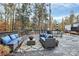 Spacious wooden deck with comfortable outdoor seating, perfect for relaxing and enjoying the natural surroundings at 2164 Mission Rd, York, SC 29745