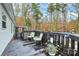 Outdoor deck space overlooking tree-filled backyard, with comfortable seating at 2164 Mission Rd, York, SC 29745