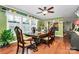 Elegant dining room features a large table, ornate chairs, and abundant natural light for entertaining guests at 2164 Mission Rd, York, SC 29745