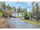 Charming home with ample parking, mature trees, and a well-maintained lawn at 2164 Mission Rd, York, SC 29745