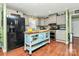 Charming kitchen featuring a movable island with butcher block top and modern black appliances at 2164 Mission Rd, York, SC 29745
