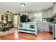 Bright, updated kitchen with center island, stainless steel appliances, and eat-in dining area at 2164 Mission Rd, York, SC 29745
