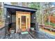 Private outdoor sauna set within a wooden frame and complemented by natural wood finishes at 2164 Mission Rd, York, SC 29745